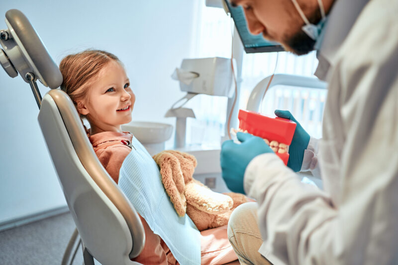 young girl at her dental exam with a pediatric dentist in San Jose