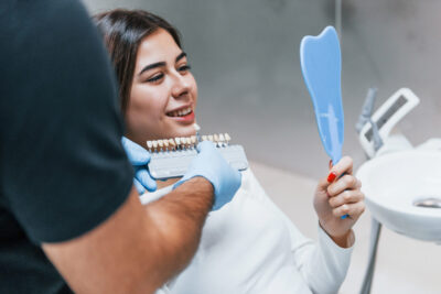 woman happy to have a new smile with veneers 