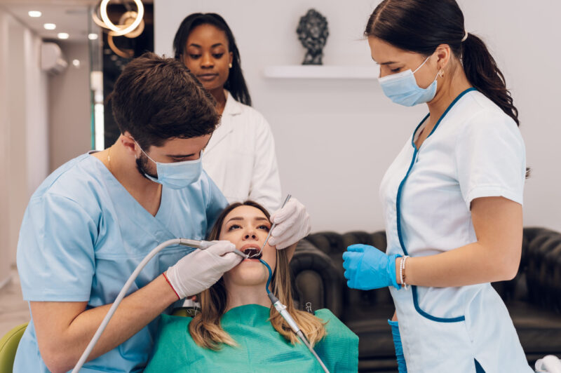 orthodontist vs dentist , woman at the dentist