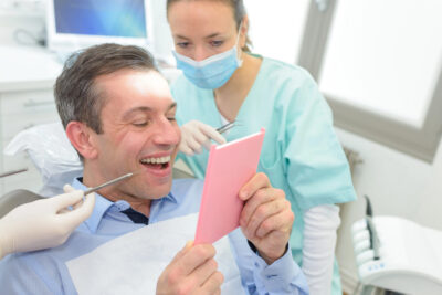 patient is happy with his dental bridge procedure 